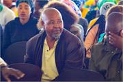 07 - Members of the community listening to Minister Senzo Mchunu during his speech